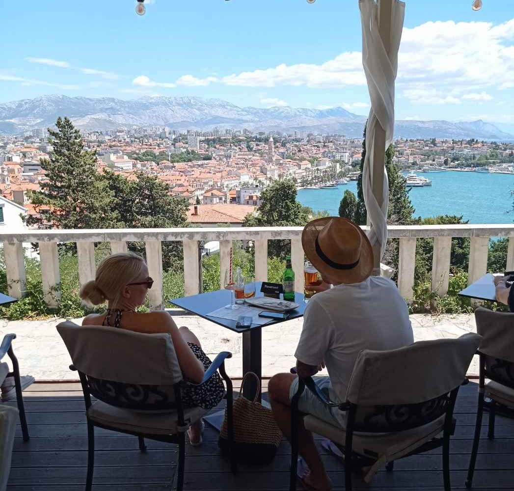 Two people having a drink on a Marjan hill cafe in Split